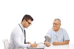 doctor testing man for diabetes heart disease